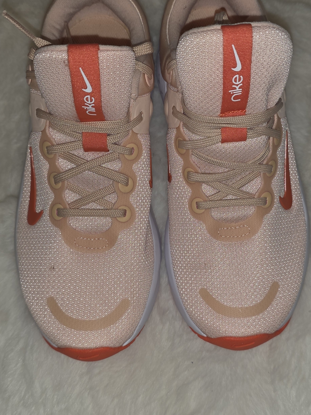 Nike Women’s Peach and Coral Running Sneakers